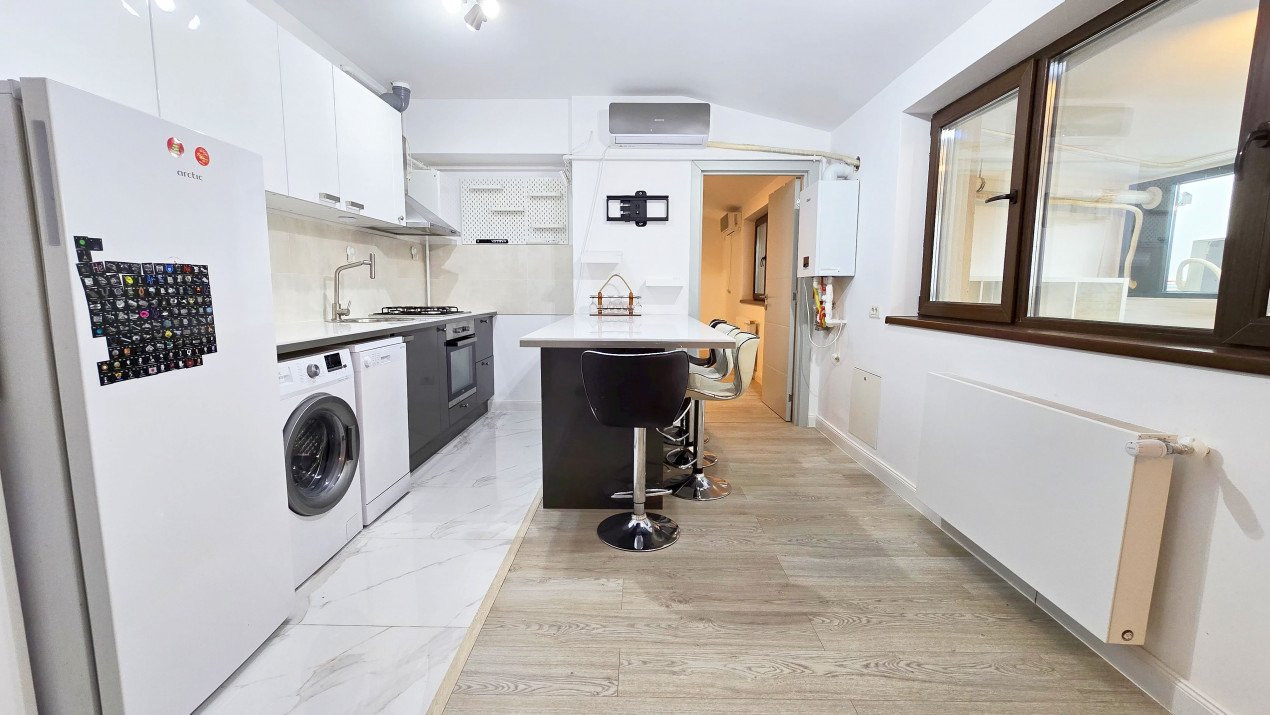 Apartament intim in bloc elegant cu gradina - Sisesti 59