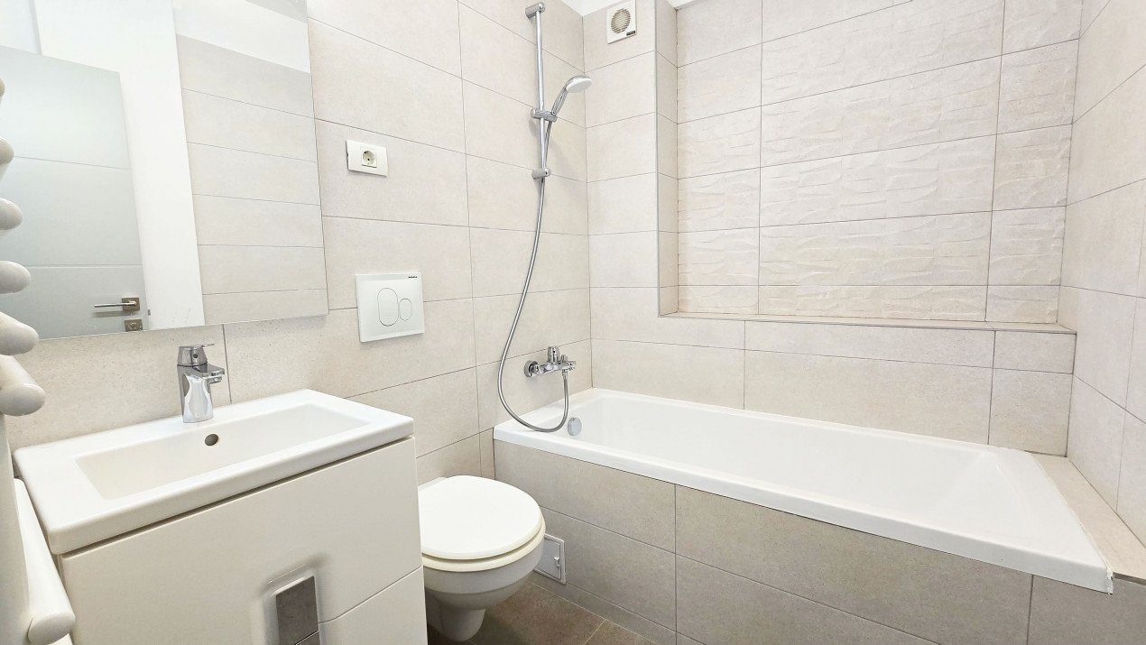 Apartament intim in bloc elegant cu gradina - Sisesti 59