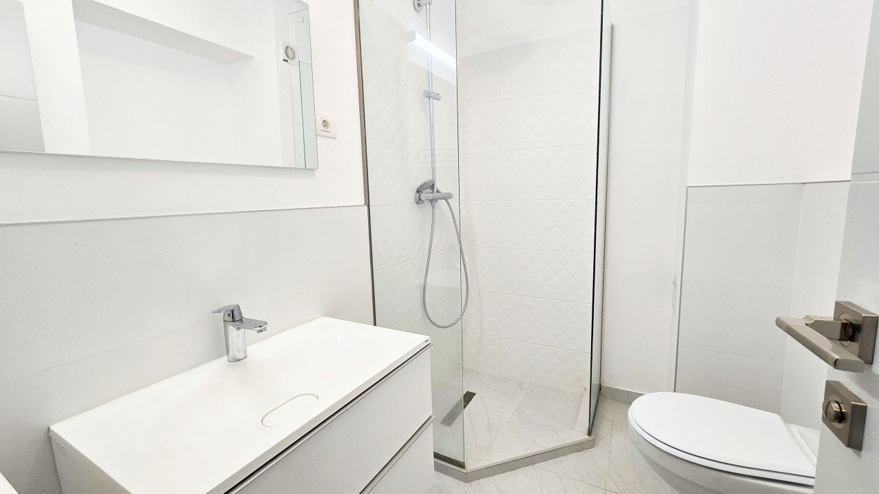 Apartament intim in bloc elegant cu gradina - Sisesti 59