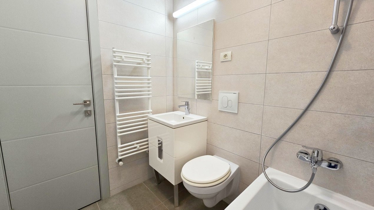 Apartament intim in bloc elegant cu gradina - Sisesti 59