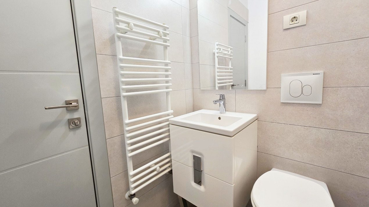Apartament intim in bloc elegant cu gradina - Sisesti 59