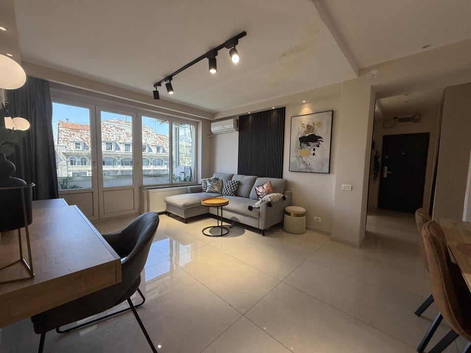 Unicat în Piața Romană! 2 camere, 53 mp, renovat integral cu designer