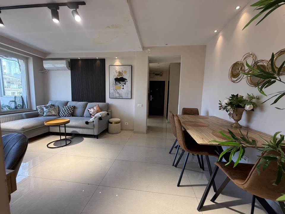 Unicat în Piața Romană! 2 camere, 53 mp, renovat integral cu designer